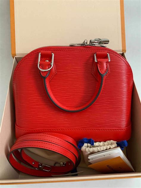 lv alma bb epi red|Alma BB Epi Leather .